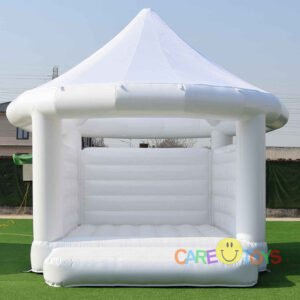 white bouncy castle with roof