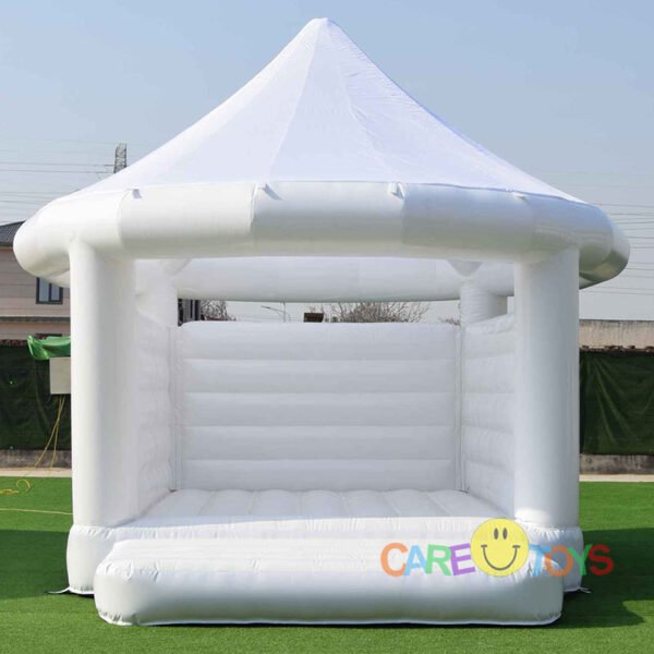 white bouncy castle with roof